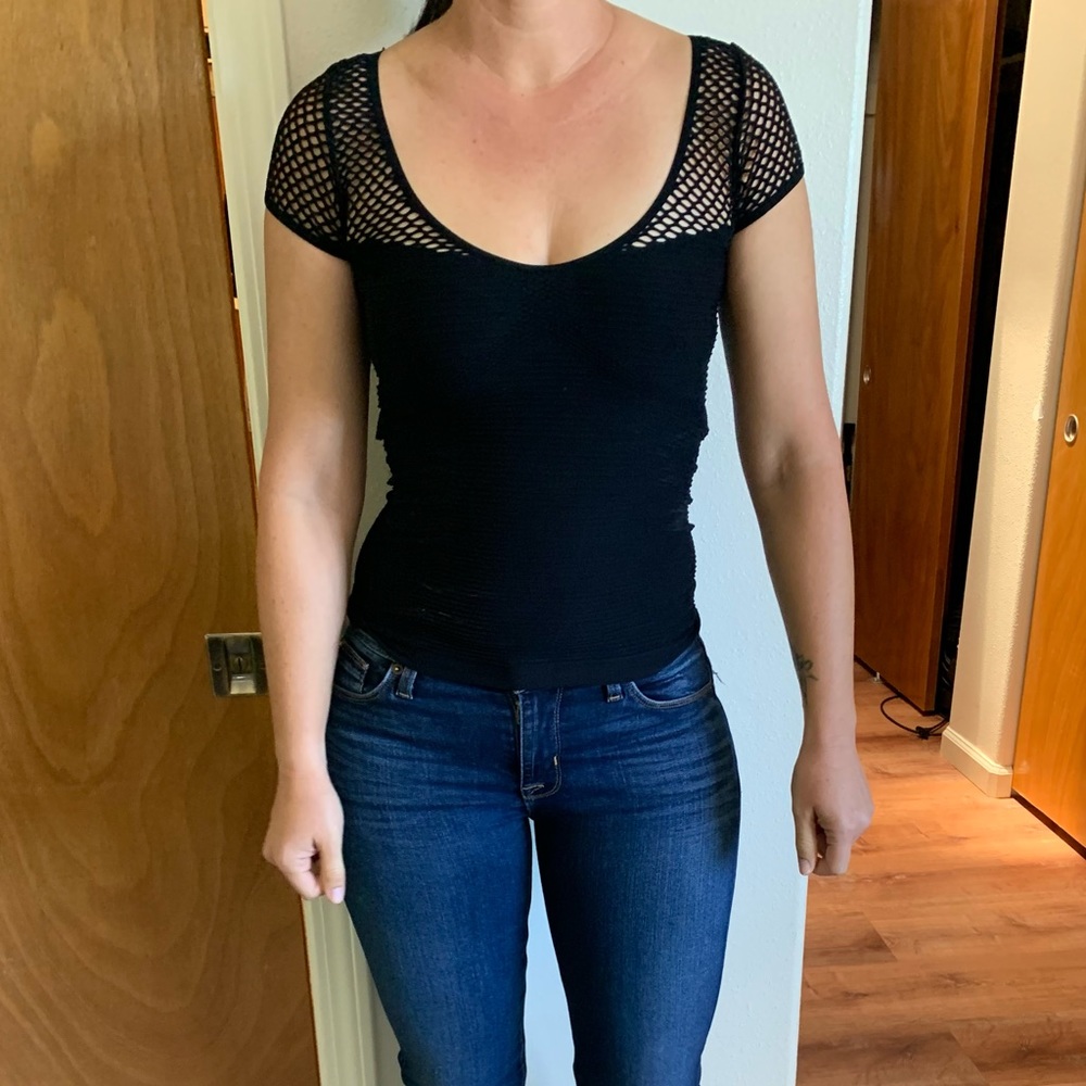 Black fitted Bebe top.